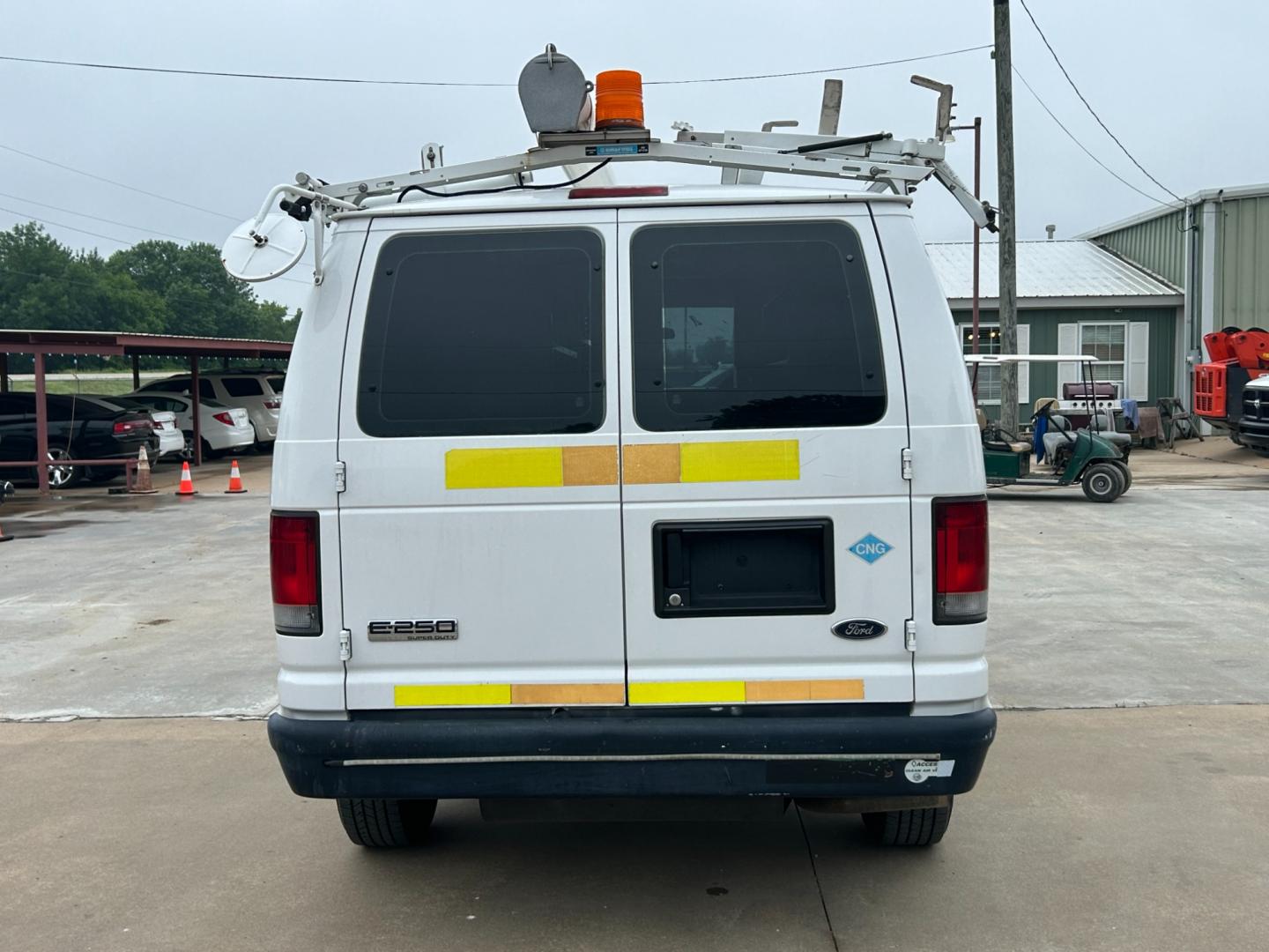 2010 White /Gray Ford E-Series Van E-250 (1FTNE2EL2AD) with an 5.4L V8 SOHC 16V engine, 4-Speed Automatic transmission, located at 17760 Hwy 62, Morris, OK, 74445, (918) 733-4887, 35.609104, -95.877060 - 2010 FORD E-SERIES VAN E-250 5.4 V8 DEDICATED CNG (COMPRESSED NATURAL GAS) DOES NOT RUN ON GASOLINE. FEATURES MANUAL SEATS, MANUAL LOCKS, MANUAL WINDOWS, MANUAL MIRRORS, AM/FM STEREO. IT IS EQUIPPED WITH A CNG FUELING SYSTEM, IT RUNS ON COMPRESSED NATURAL GAS. A PREMIER ALTERNATIVE FUEL THAT IS EXTR - Photo#5